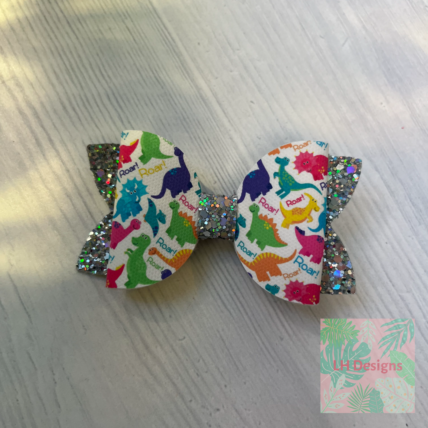 Multicoloured Dinosaur Hair Bow